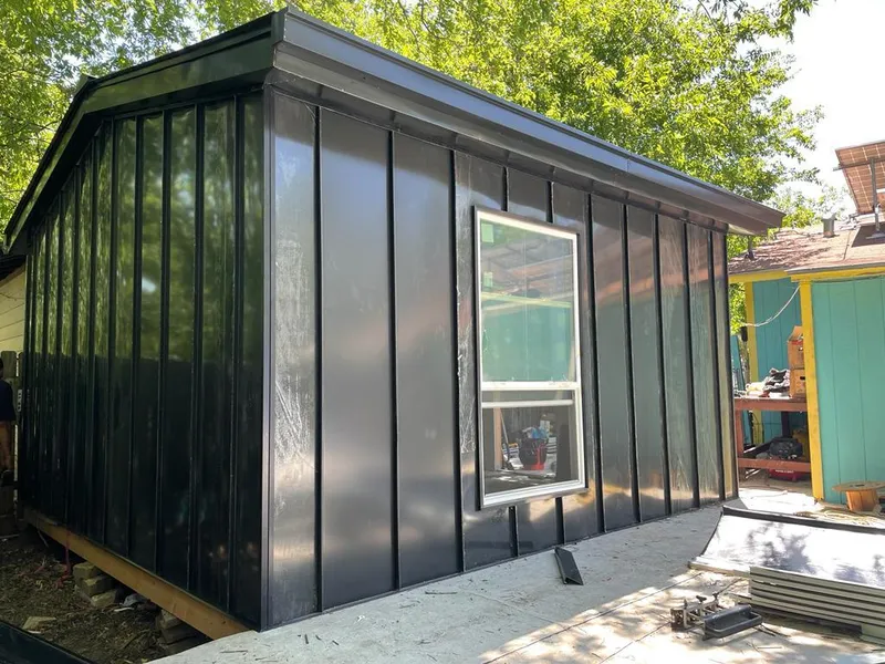 Black standing seam metal wall panels for Roof Inspection in Wesley Hills