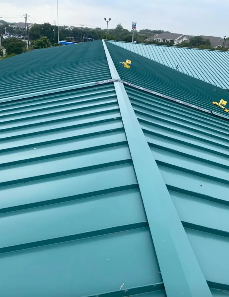Green commercial metal roof ridge and valley for Metal Roof Repair in Wesley Hills